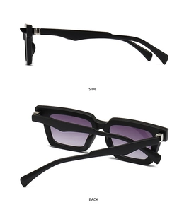 Macro view of matte black rectangle sunglasses with purple gradient lenses and silver hinges