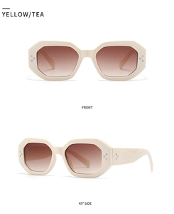 Detailed front and side views of cream oval sunglasses with tea gradient lenses and metal rivets