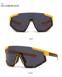 Detailed front and side view of yellow and black oversized one-piece cycling sunglasses