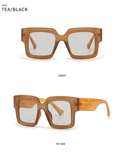 Detailed front and 45-degree side view of tea-colored tortoiseshell square fashion glasses