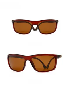 Detail view of square polarized sports sunglasses with dark red frames and brown lenses