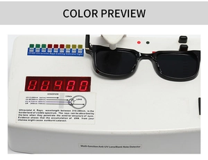 Detail showing UV400 protection test for square black sunglasses with digital reader