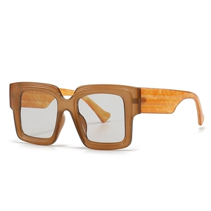 Retro square blue light blocking glasses with amber marble texture on white background