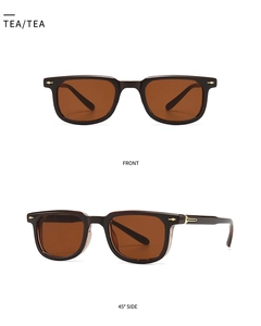 Close-up of retro square tea sunglasses featuring elegant arrow metal rivets on the side