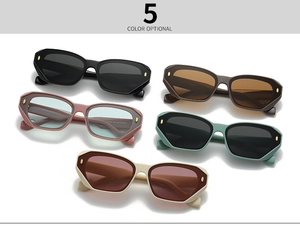 Detailed display of five colorful polygonal sunglasses with metal rivet decorations