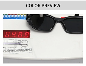 Detail view of black rectangular sunglasses undergoing professional UV protection testing