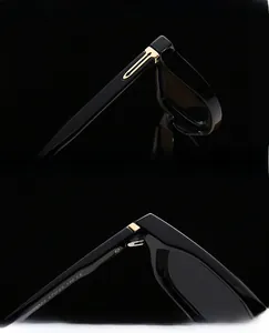 Detail of sunglasses hinge and temple with gold metal accents and UV protection lens
