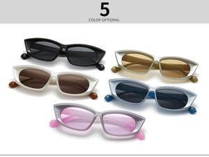 Flat lay of vintage cat eye sunglasses in five colors including black and pastel tones