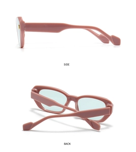 Detailed side and back view of pink thick-frame sunglasses with blue-green tinted lenses