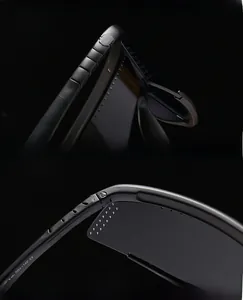 Detail of thickened reinforced lenses and precision hinge on black sports sunglasses