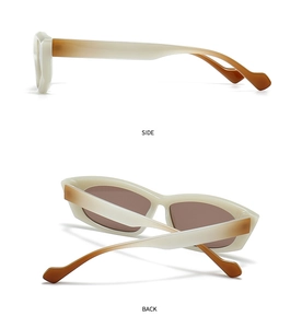 Detail view of cream to amber gradient sunglasses with brown lenses and side arm design