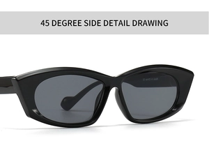 Detail view of bold black polygonal sunglasses frame and dark UV-protective lenses