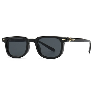 Classic black oversized square sunglasses with gold metal arrow accents and grey lenses
