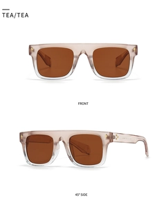 Vues frontale et latérale des lunettes de soleil oversize thé translucide avec rivets