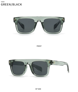 Détail de lunettes de soleil carrées vertes avec des rivets fléchés dorés élégants