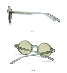 Vue détaillée des lunettes de soleil rondes rétro vert olive avec charnières dorées