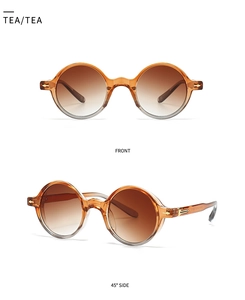 Détails de lunettes de soleil rétro ambre avec verres dégradés et accents dorés chic