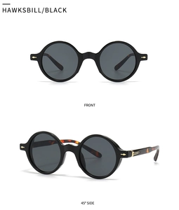 Vues de face et de profil à 45 degrés de lunettes de soleil rondes rétro à branches écaillées