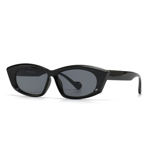 Vintage polygonal black sunglasses for women with thick frames and dark grey lenses