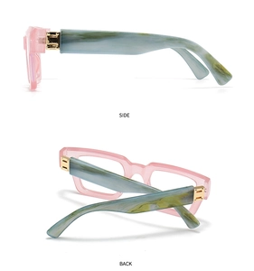 Detail view of pink translucent glasses frame with blue marble-patterned temples