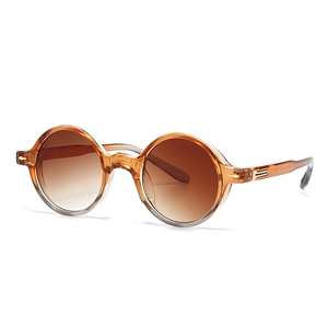 Lunettes de soleil rondes ambre rétro avec verres dégradés bruns et détails dorés