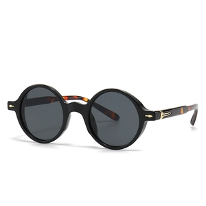 Lunettes de soleil rondes rétro classiques avec monture noire et branches tortue