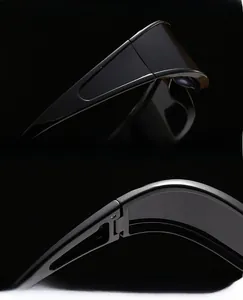 Detail view of reinforced metal hinge and thick UV protection lens on black sunglasses