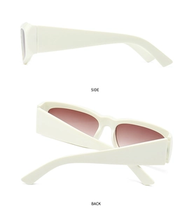 Detail view showing side and back of modern cream sunglasses with reddish-brown lenses