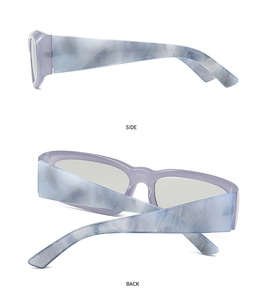 Detail view of purple sunglasses with blue and white marble pattern temples from side and back