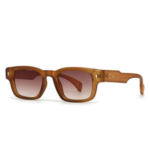Retro square sunglasses in amber acetate frame with brown gradient lenses and metal rivets
