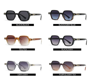Matrix display of narrow hexagonal sunglasses in multiple gradient colors with gold metal trim