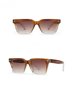 Macro view showing tortoise shell frame and arrow metal rivets on square sunglasses