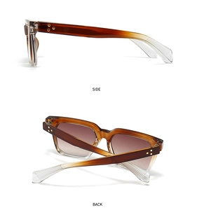 Detail view of tortoiseshell square sunglasses with gold star studs on side and back