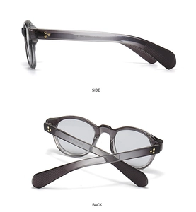 Detailansicht graue transparente Brille mit Metallstern-Scharnieren und rutschfesten Bügeln