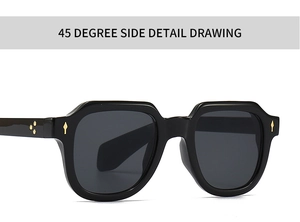 Détail des lunettes de soleil carrées noires avec rivets dorés et étoiles décoratives