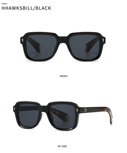 Narrow rectangular black frames with tortoiseshell temples and gold rivet details