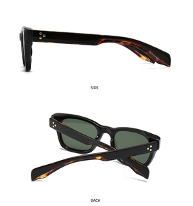 Detail of square sunglasses with tortoise temples and gold floral rivets on the side