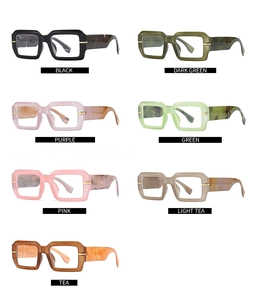 Multiple colors of square frame glasses showing marble pattern temples and gold accents
