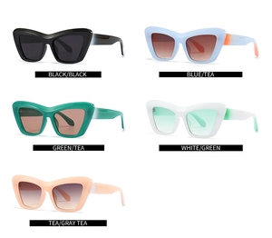 Dettaglio di cinque occhiali da sole cat-eye in vari colori sfumati e montature jelly