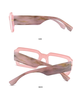 Detail of pink transparent glasses frame featuring marble patterns on side and back views