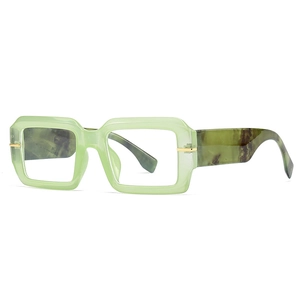 Modern square frame glasses with translucent green finish and marble patterned temples