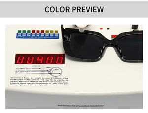 Detail einer eckigen Sonnenbrille, die an einem UV400-Schutzmessgerät getestet wird