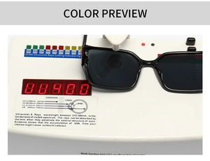 Detail view of square black sunglasses lens during a professional UV400 protection test