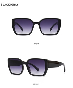 Detail view of square oversized black sunglasses with gradient lenses in front and side views
