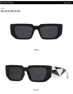 Vue détaillée de lunettes œil de chat avec monture noire et motif géométrique sur branches