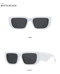 Vue détaillée de lunettes de soleil œil-de-chat blanches avec branches à motifs triangulaires