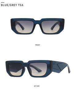 Vue détaillée des lunettes de soleil œil-de-chat gris-bleu avec branches géométriques en relief