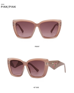Detailed front and side views of pink cat-eye sunglasses with triangle floral pattern