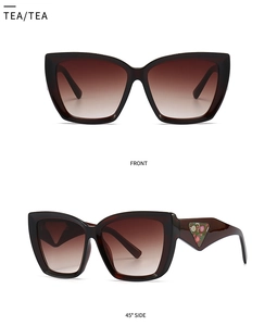 Detailed front and side views of tea-colored cat eye sunglasses with floral triangular accents