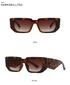 Détail de lunettes de soleil œil-de-chat écaille avec branches géométriques et verres thé